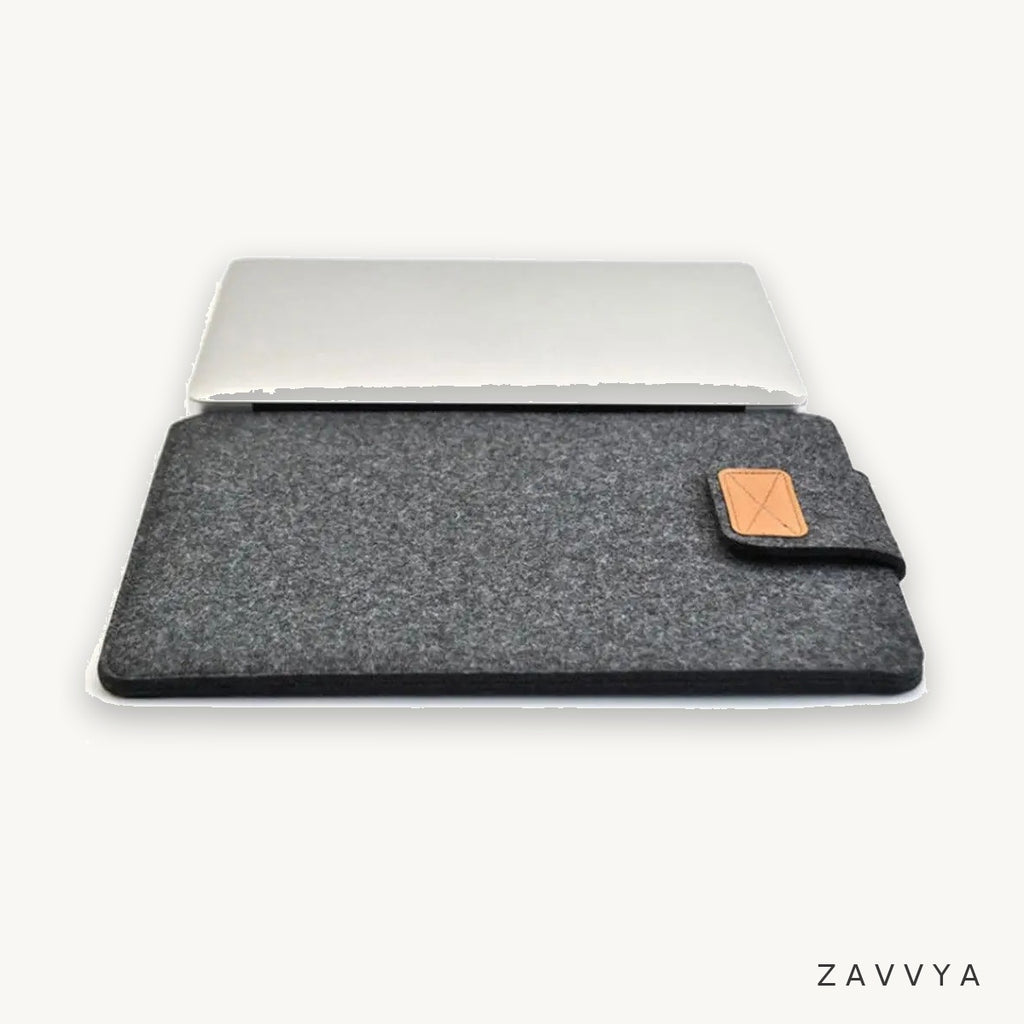 Dark grey felt sleeve shown with a laptop