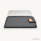 Dark grey felt sleeve shown with a laptop