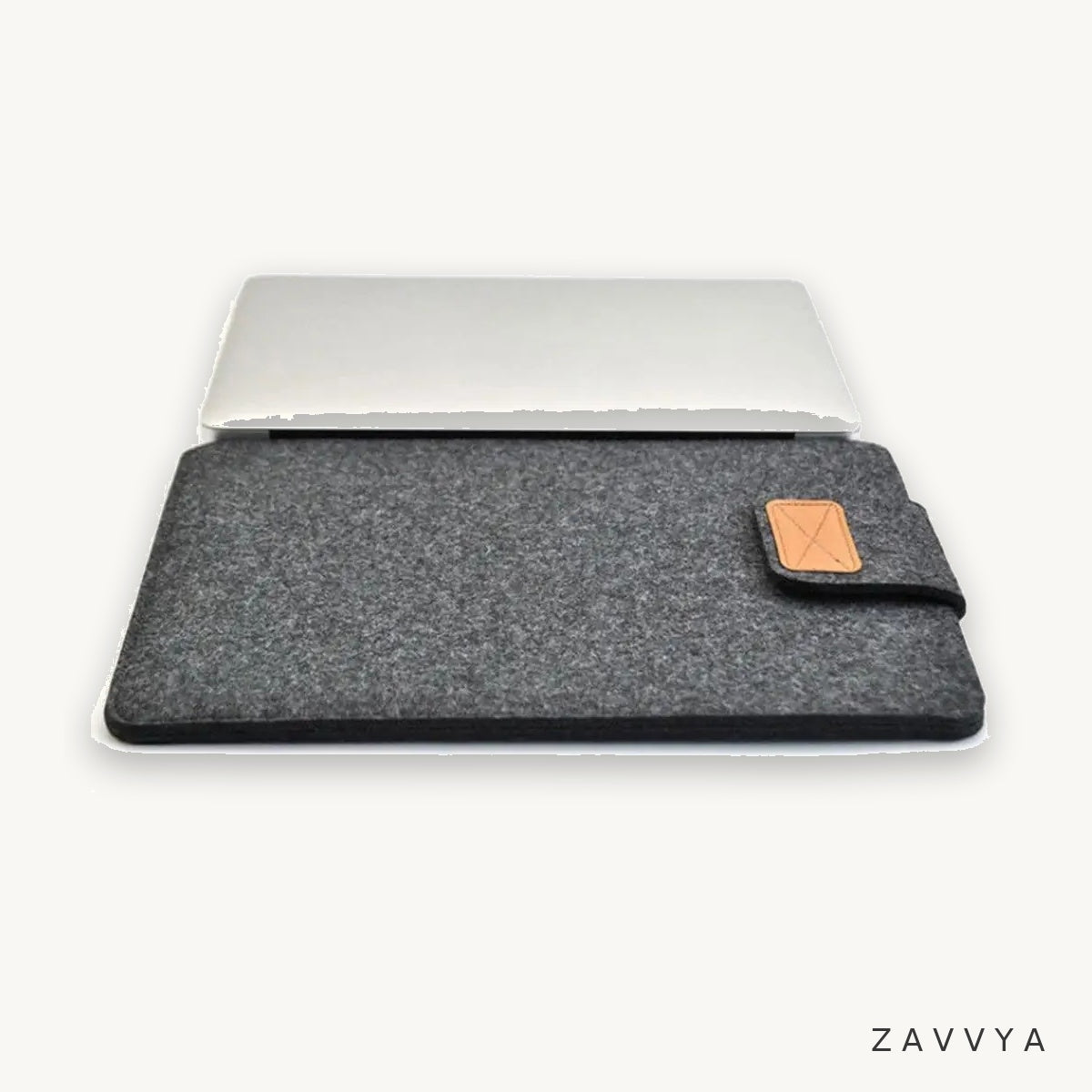 Dark grey felt sleeve shown with a laptop