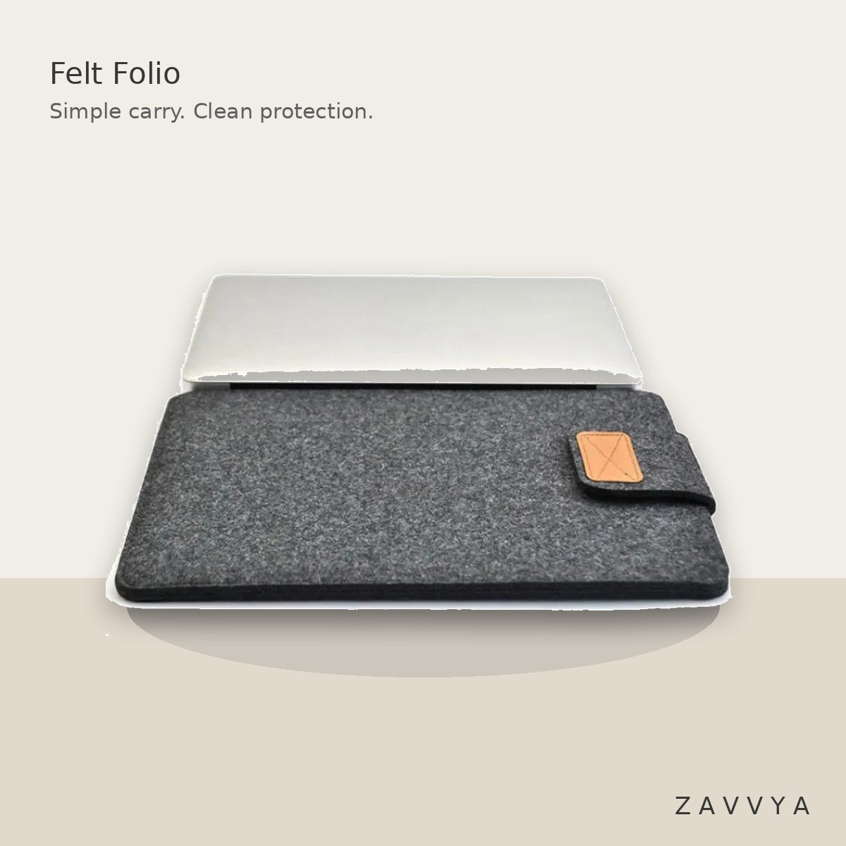 Dark grey felt sleeve in a premium lifestyle setting