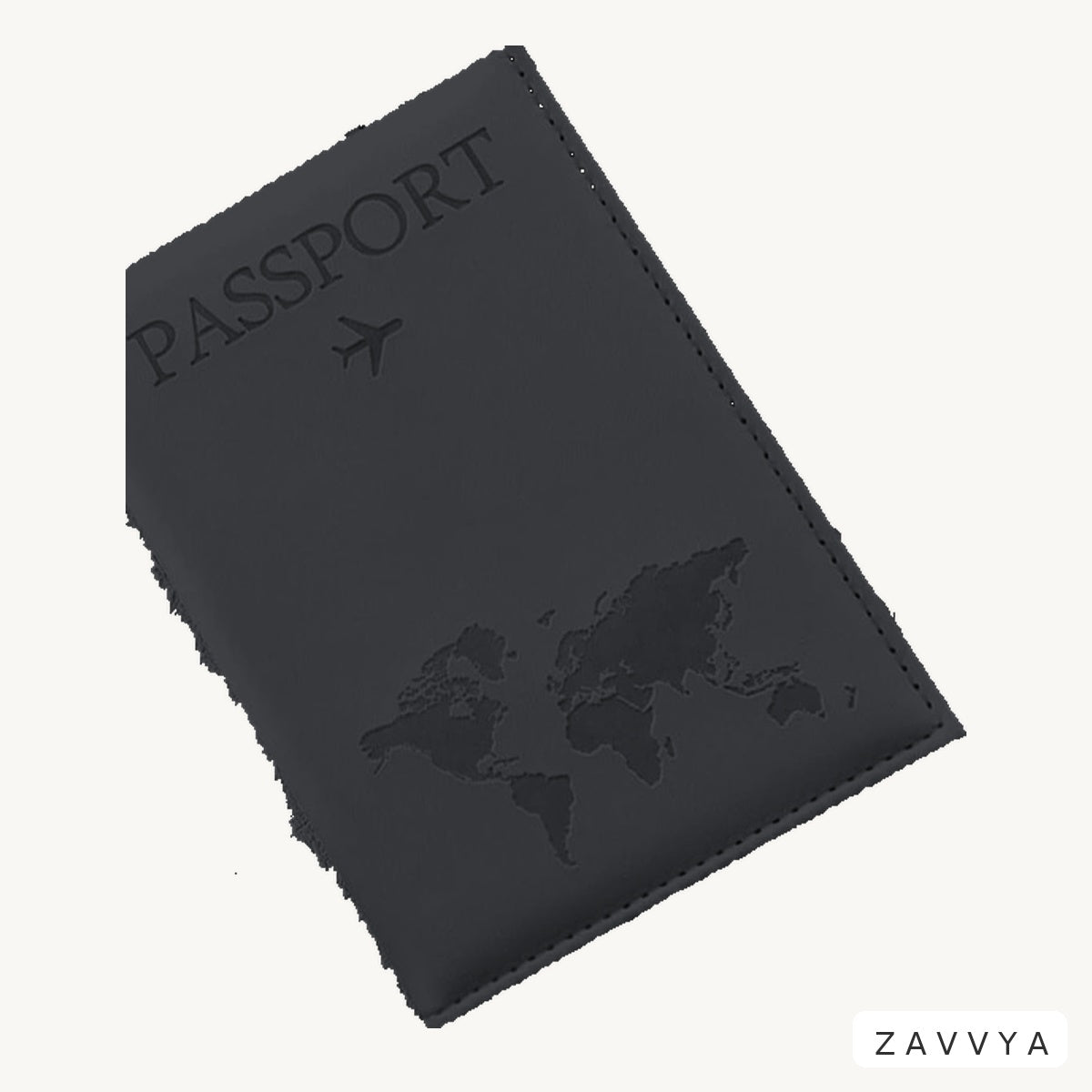 Close-up of the embossed passport, plane and world-map motif on the ZAVVYA Transit Folio